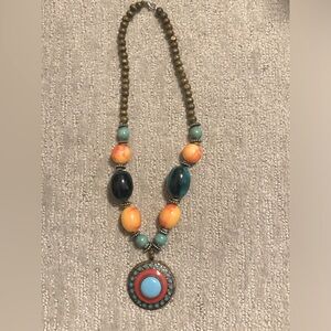 Wood, glass and metal beaded necklace.